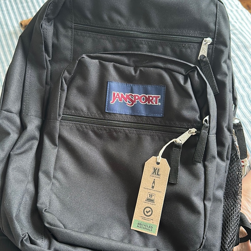 Black Jansport XL backpack brand new (daughter just changed her mind)